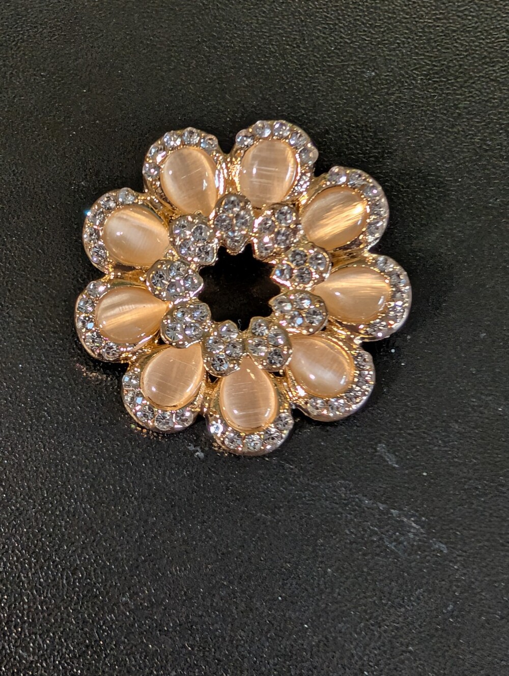 Gold-Tone Floral Crystal Brooch with Champagne Petals